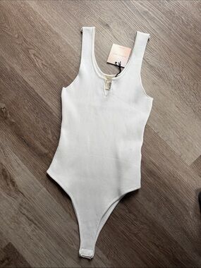White Ribbed One-Piece Bodysuit